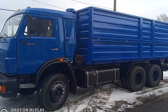 Грузовик с открытым кузовом КАМАЗ 65115 