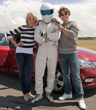 Unmasked: Top Gear star The Stig with special guests Cameron Diaz and Tom Cruise. The Stig's true identity has been revealed as Ben Collins