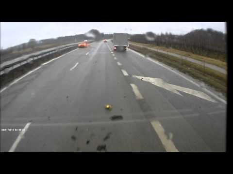 McLaren 650S crashes on a rainy highway